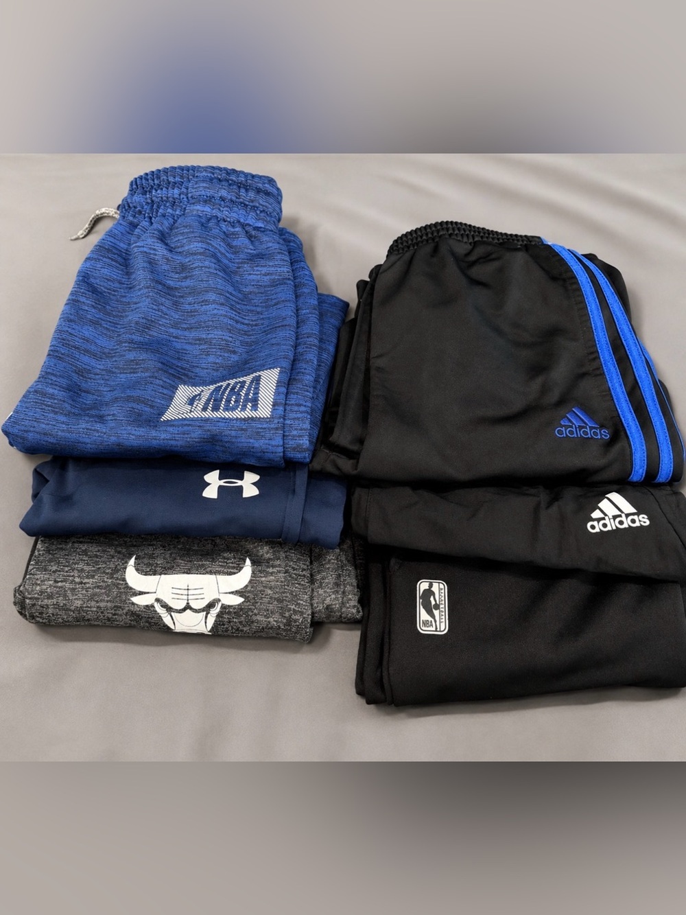 7 pairs of joggers. NIKE, NBA, under armour, 
 - sz Large.